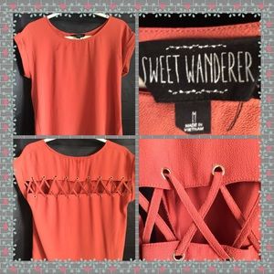 Rust top with cross cross across back